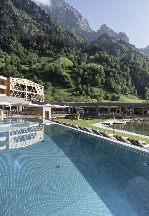 Pool at the Feuerstein Hotel with a view of the mountains
